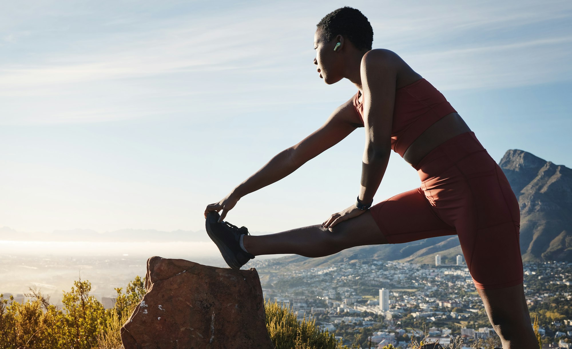 Black woman, stretching and outdoor exercise, workout and training for wellness, health and fitness